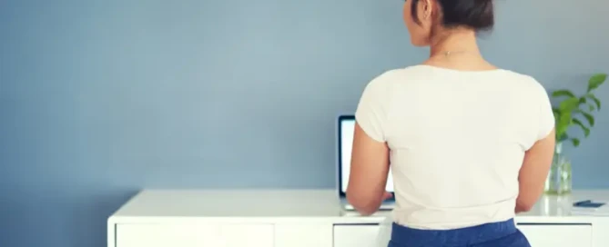 woman with a perfect posture sitting working