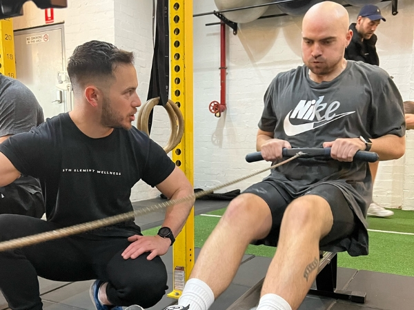 PT For Beginners_ Starting Again Shouldn’t Feel Overwhelming (2) Coaches working with members at 5th Element Wellness