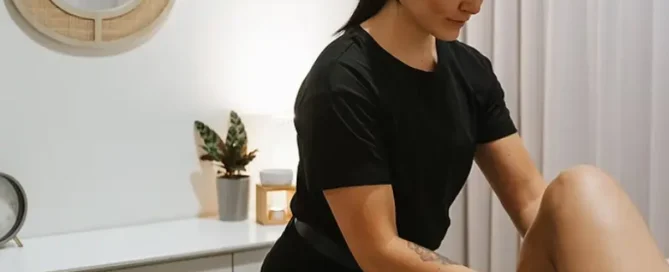 Myotherapist providing hands on treatment during a massage therapy session featured in Fitzroy North local business spotlight by 5th Element Wellness